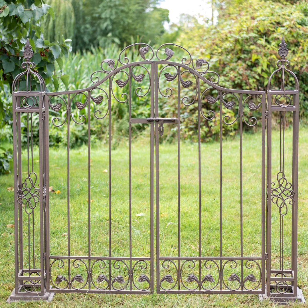 Ascalon Ornamental Gates - 'Rust Brown' placed in garden