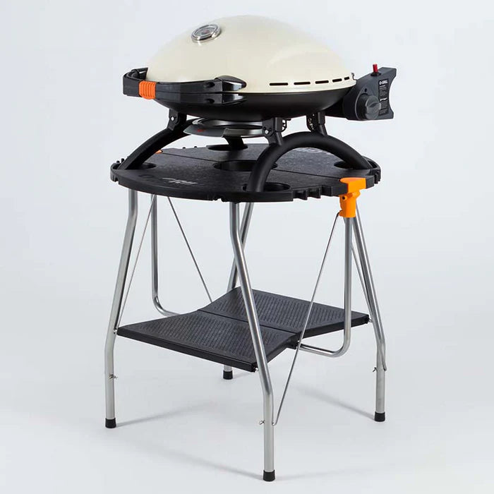 An o-dock holding up a cream o-grill 900 against a white background