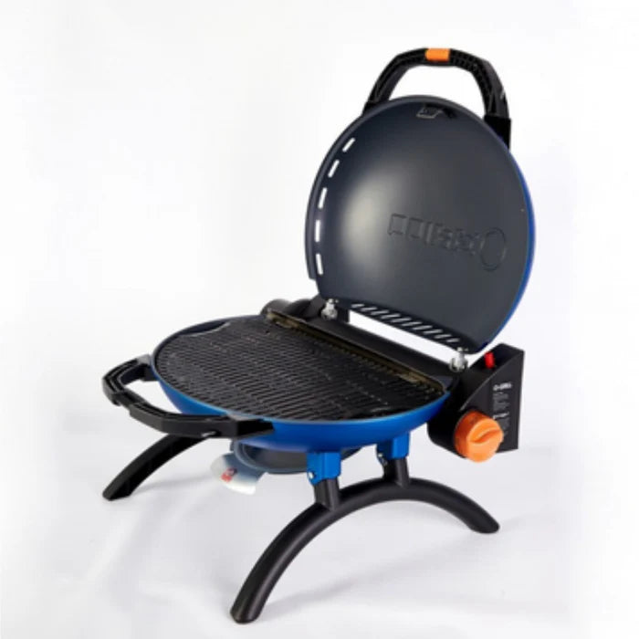 A blue O-Grill 500 opened up to show its grill