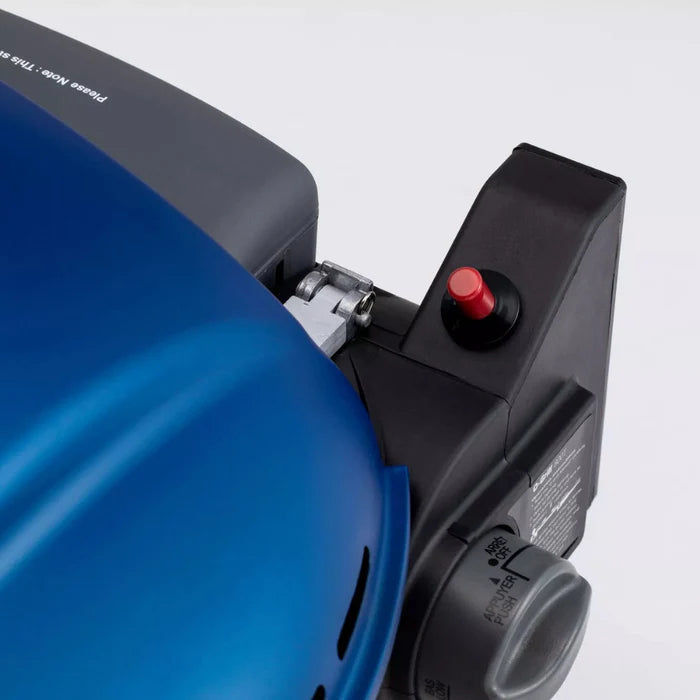 The back of a blue o-grill 600 barbecue
