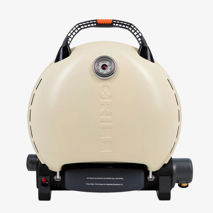 A cream o-grill 600 folded up against a white background