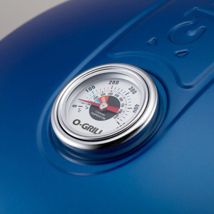 A closeup of the O-Grill 900 thermometer