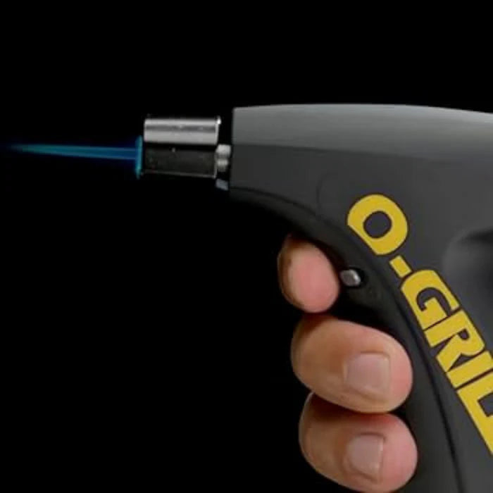 A closeup of the o-grill GJ360 precision flame torch against a black background.