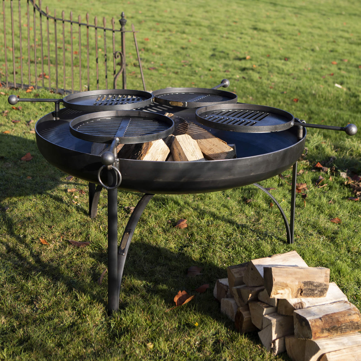 Buy Firepits UK 120cm Plain Jane Fire Pit with Four Swing Arm BBQ Racks online UK